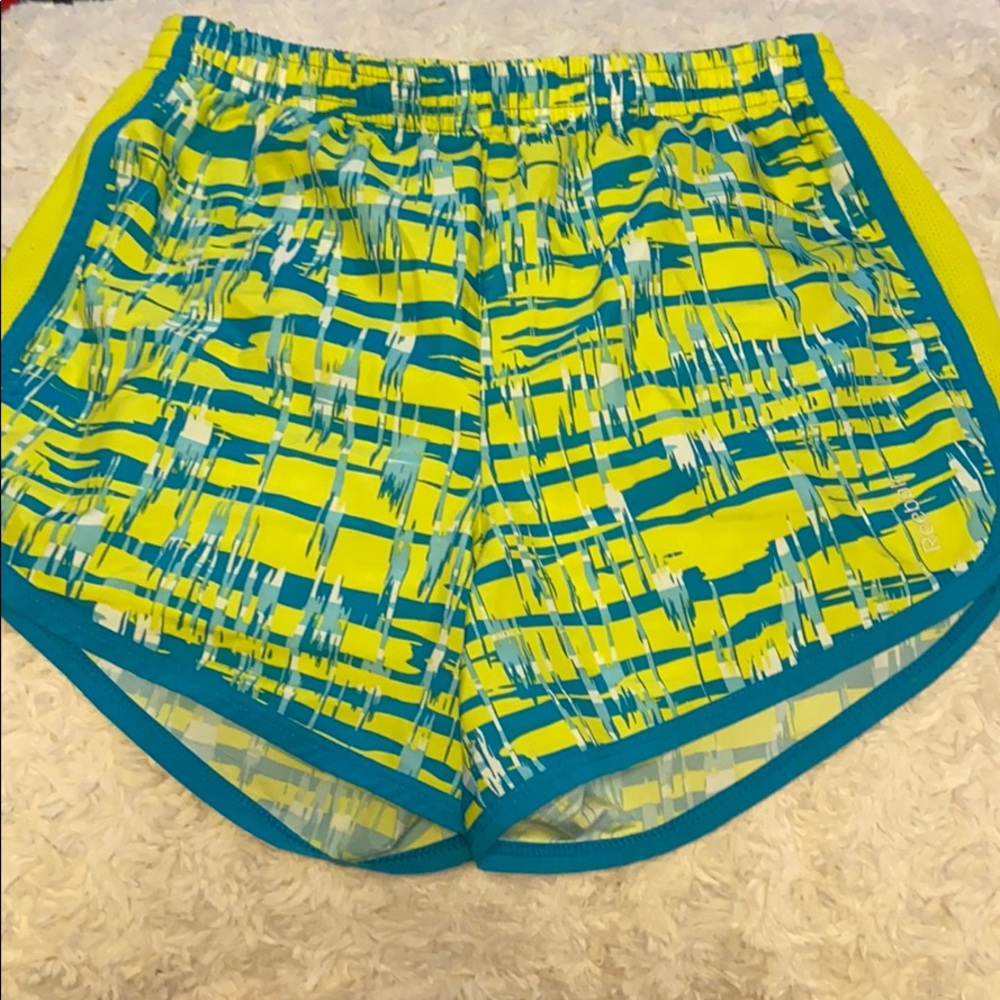 Reebok yellow and green L Junior runner shorts